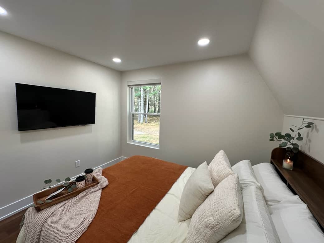 One of 4 bedroom with custom beds and comfortable bedding