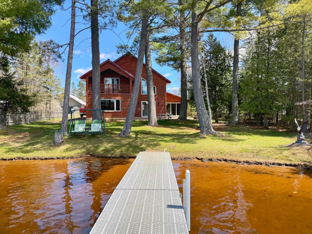 Escape to Voyageur Lake Retreat, a spacious waterfront cabin nestled in the heart of the Northwoods.