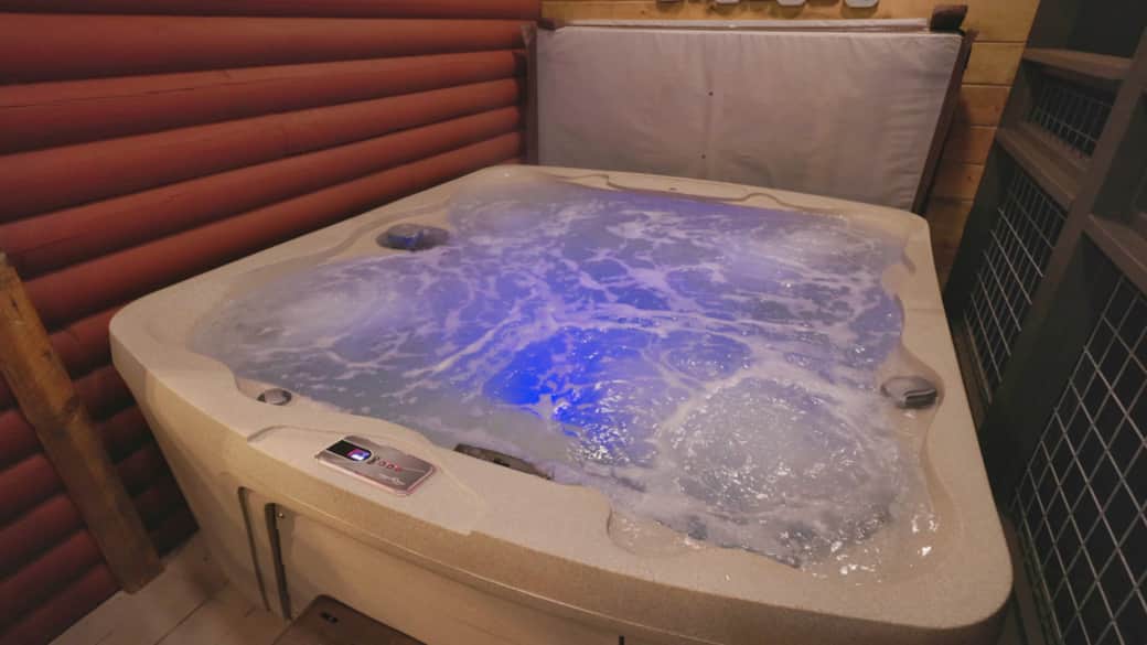 Hot tub in screened in back porch.