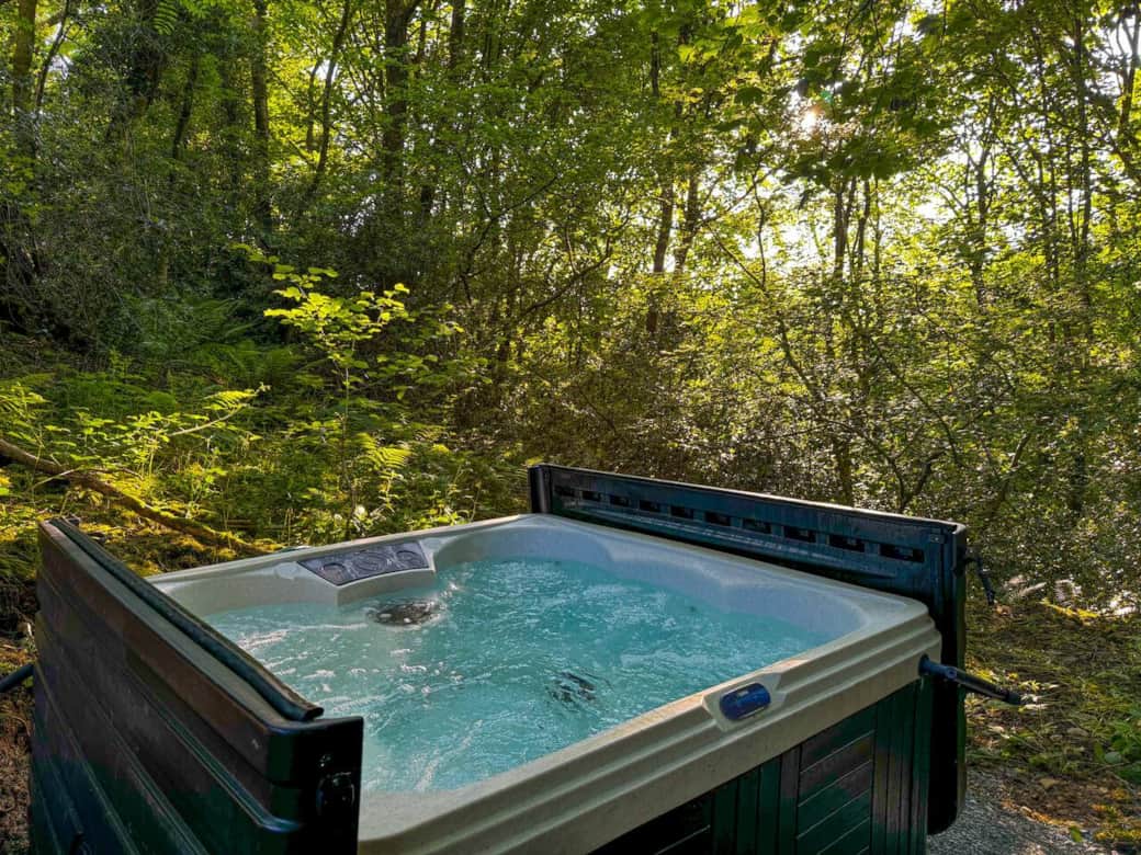 The hot tub nestled down in the wood just a short walk from The Sett. The hot tub nestled down in the wood just a short walk from The Sett.
