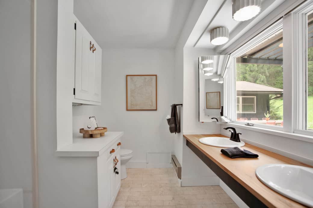 Primary bathroom with the best view of the patio, the mirror can be closed for privacy. 