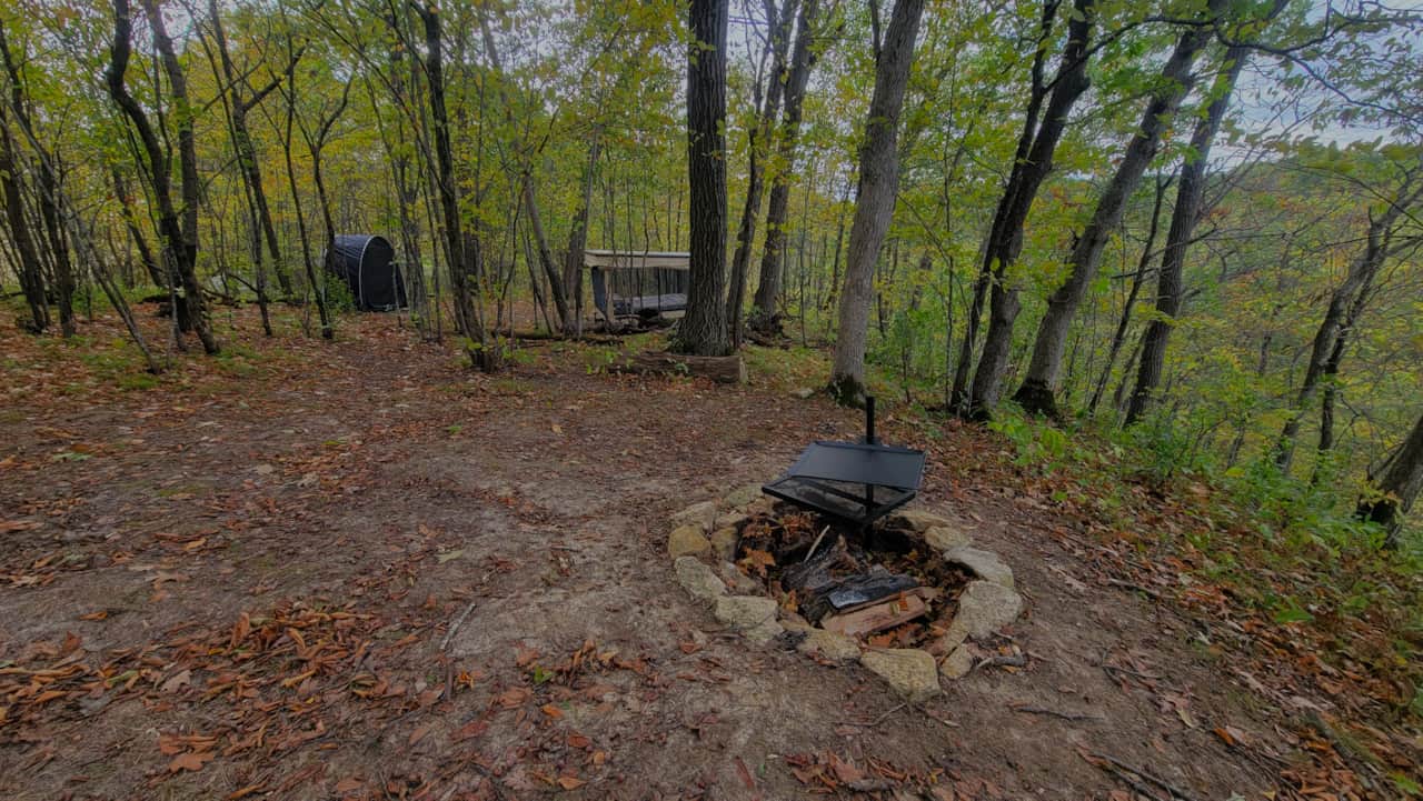 Firepit with cooking grate and skillet