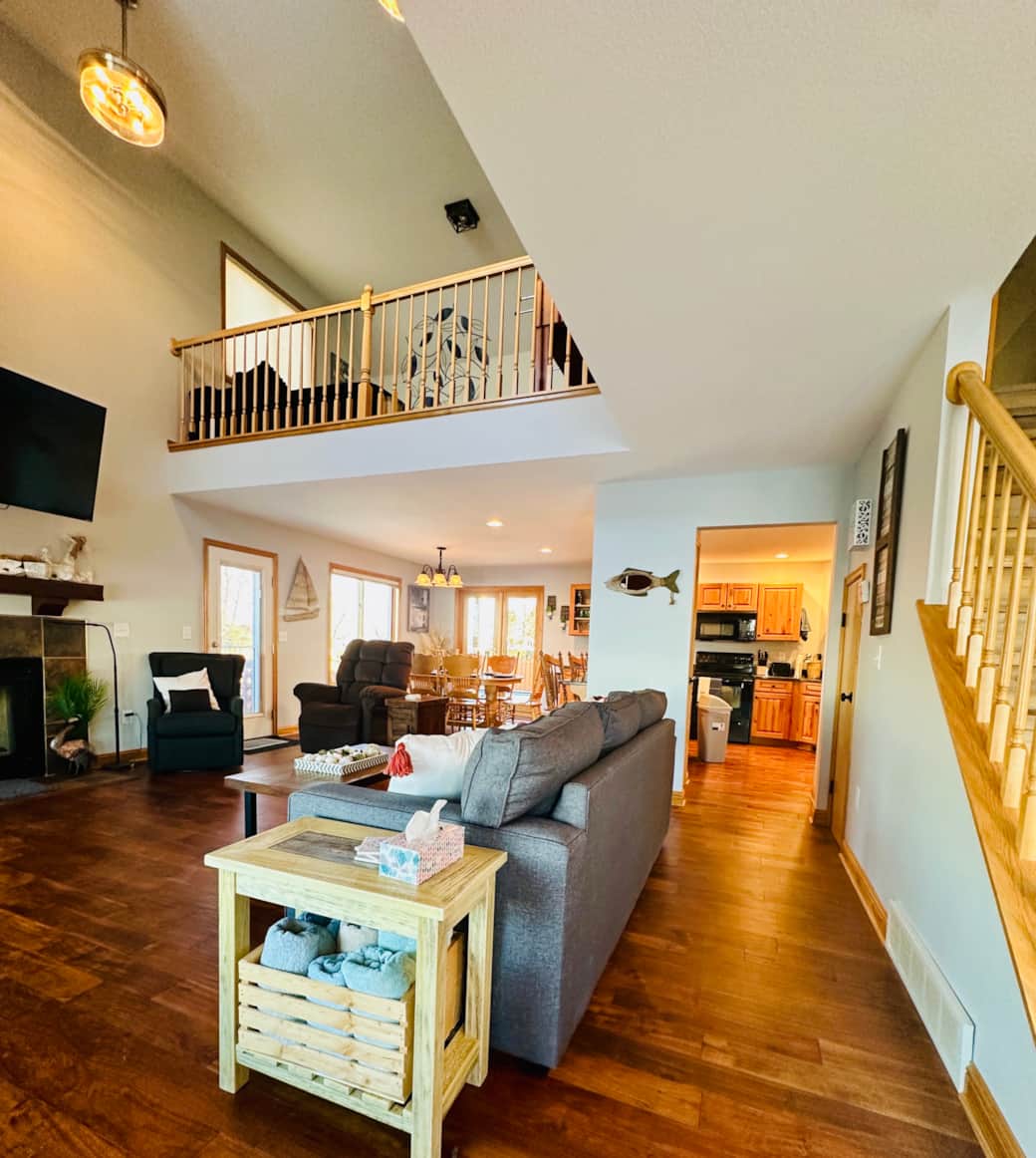 The vaulted ceilings and loft area add to the open, airy feel of the space. The vaulted ceilings and loft area add to the open, airy feel of the space.