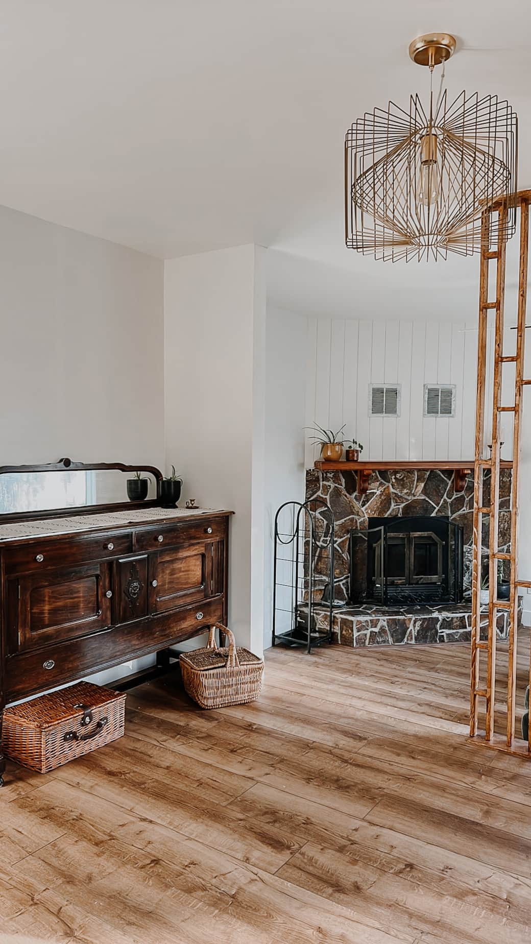 The open kitchen and dining space flows into our cozy lower lounge with fireplace.