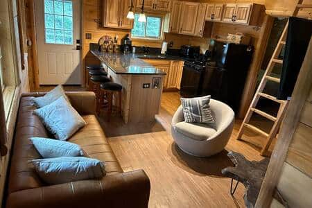 Full kitchen (fridge, range/oven, microwave, coffee maker) and counter dining for 4; in-floor heat