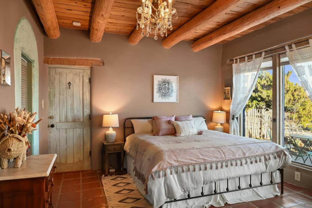 guest bedroom has soaring views of the mesa and a private door out to the firepit, hot tub and ramada guest bedroom has soaring views of the mesa and a private door out to the firepit, hot tub and ramada