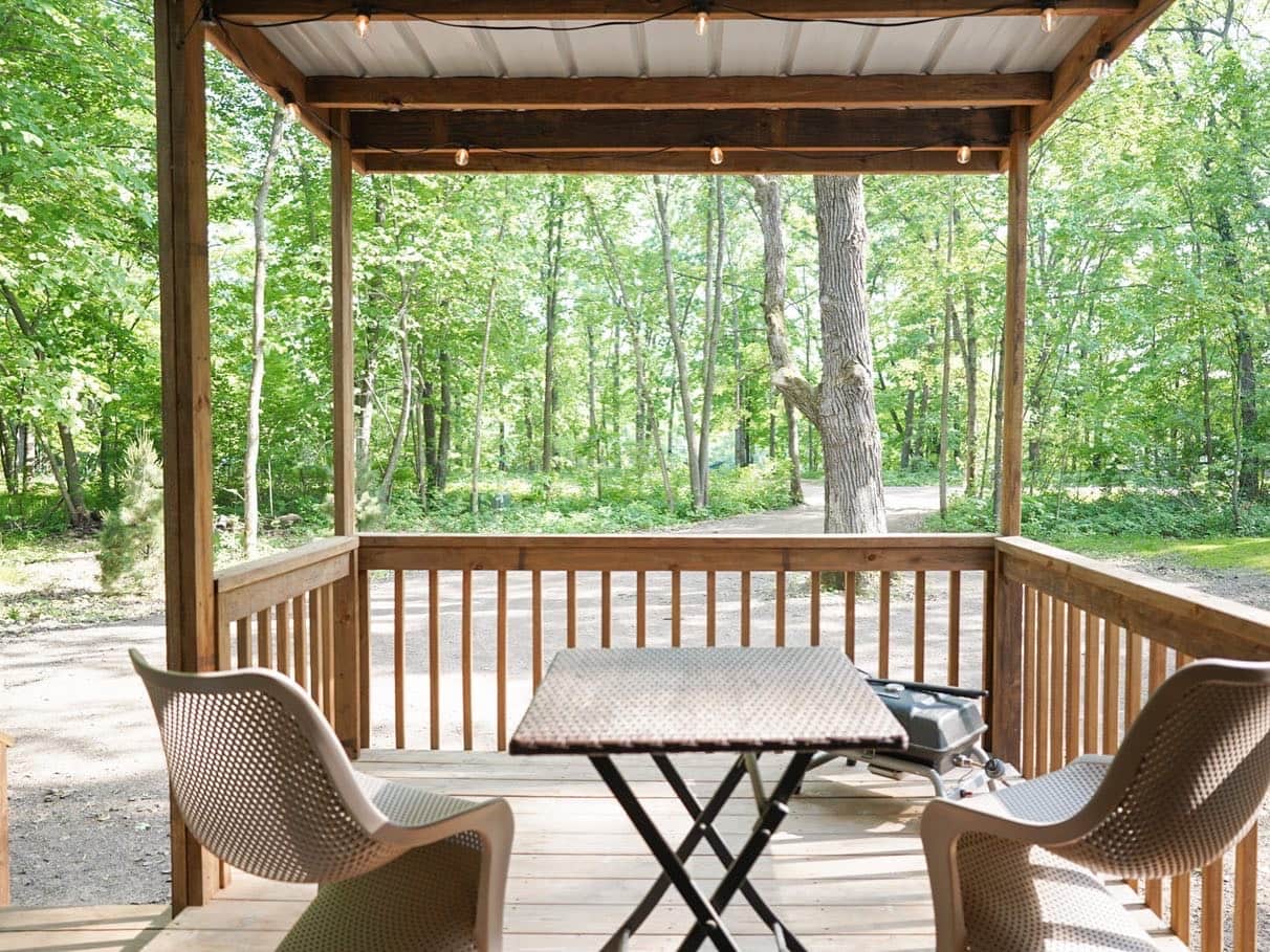 Private Screened In Porch With Grill, Table, And Chairs