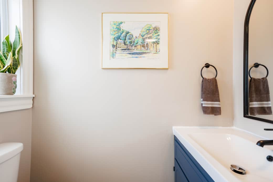 Stylish half bath with modern finishes and a clean, fresh feel.
