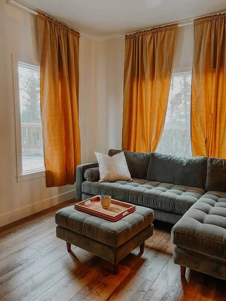 Cozy up by the fire in the lower lounge with comfortable seating and plenty of natural light. 