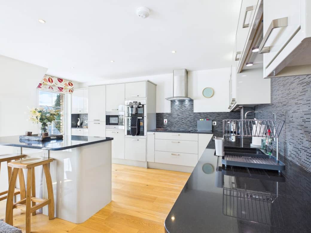 Fully stocked Kitchen with island Bar, all the utility's you will need to host your Family & Friends