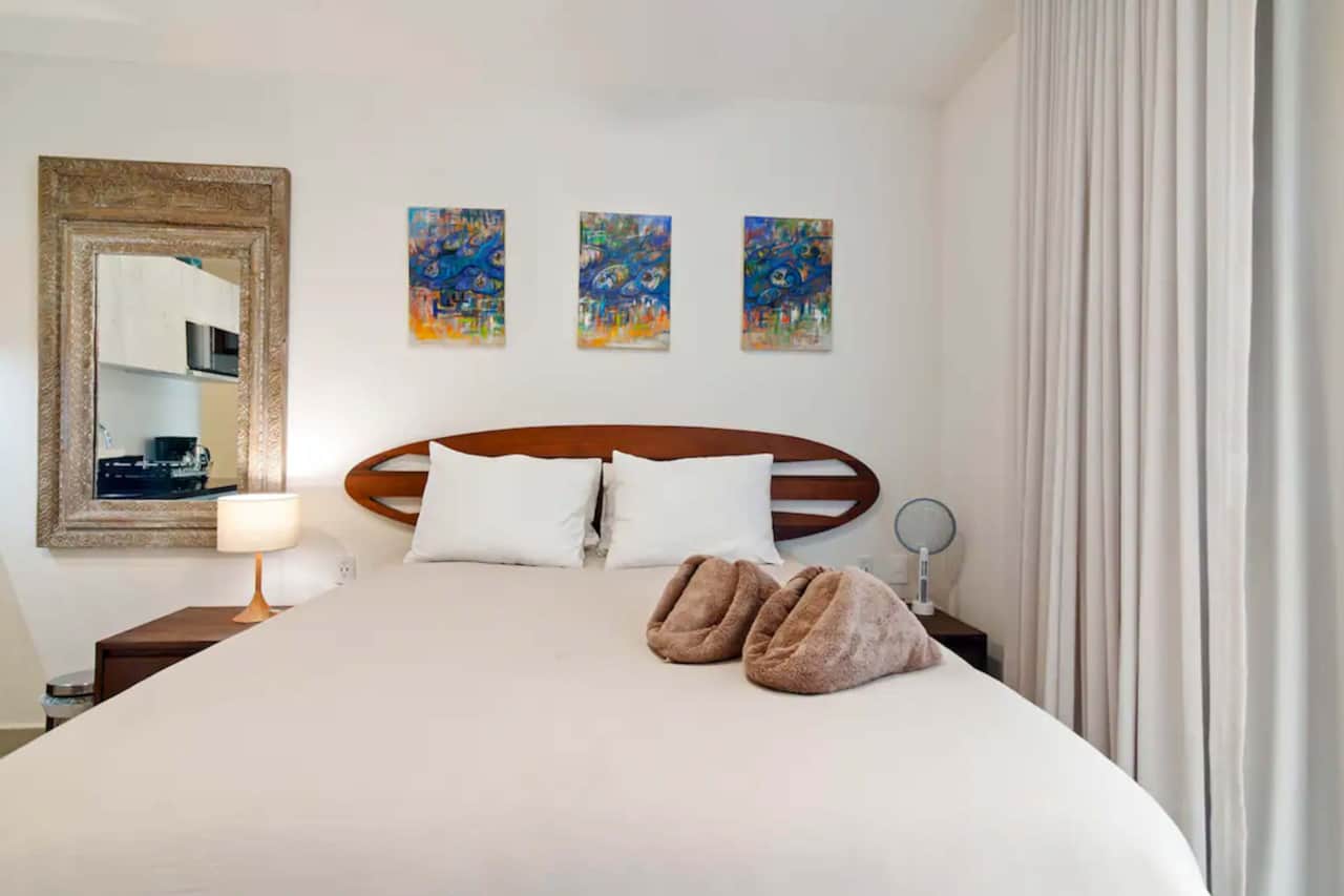 Artful tranquility: Captivating wall art, bug zapper for peaceful nights. Aesthetic comfort awaits.