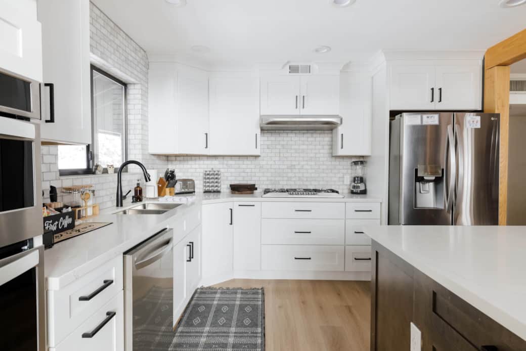 Chef's kitchen is fully stocked and has everything you need to host large family gatherings.