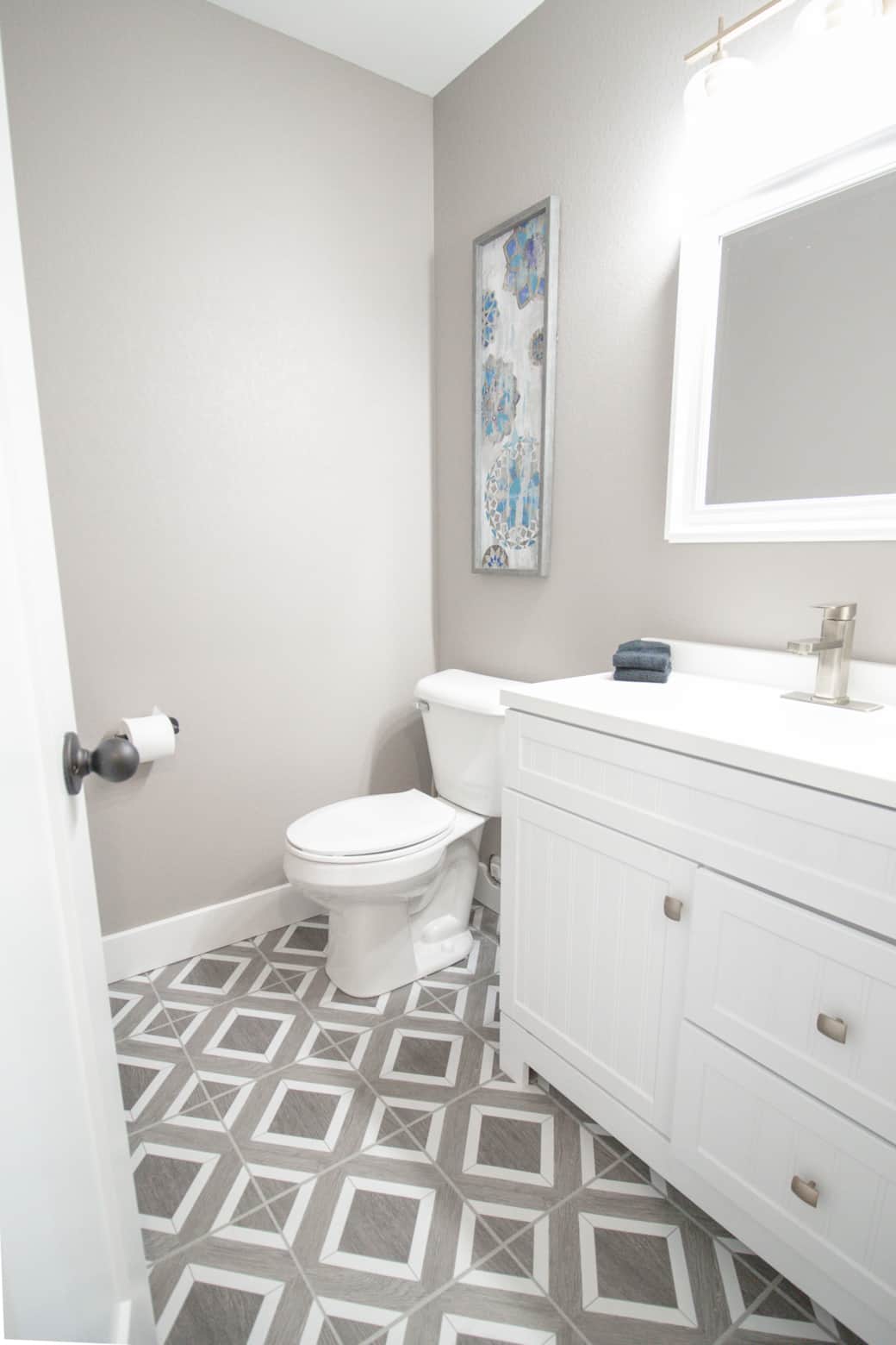 Downstairs half bath just off the kitchen