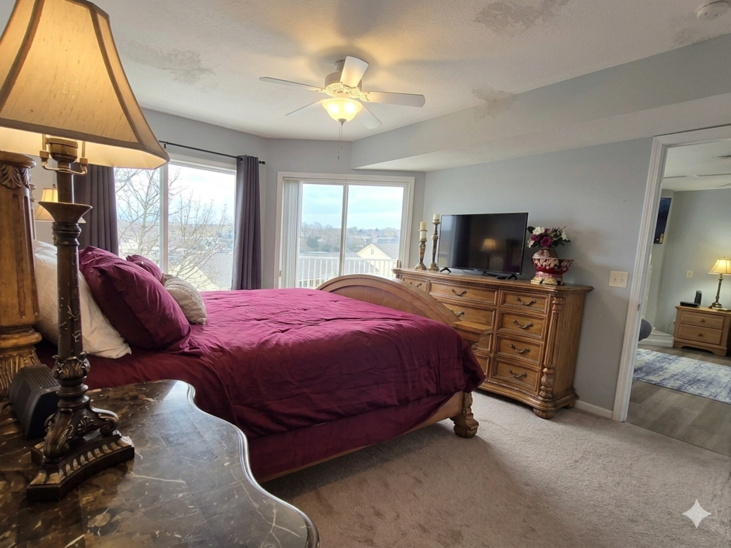 Master suite with king bed, natural light, and relaxing retreat vibes Master suite with king bed, natural light, and relaxing retreat vibes