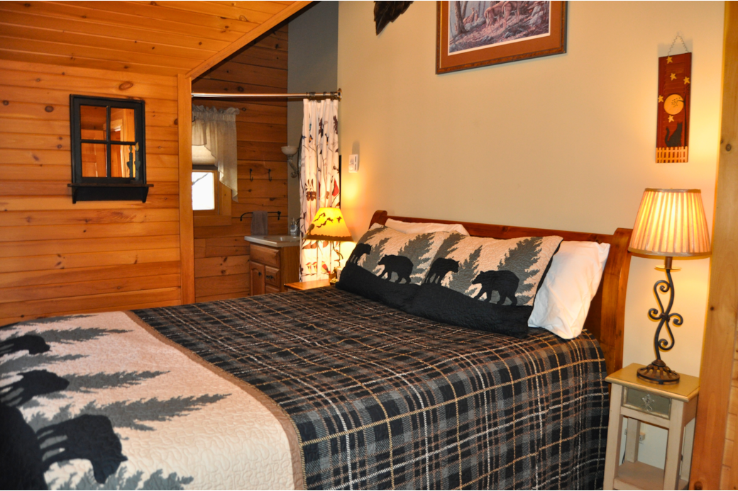 Bedroom on second level, balcony and 1/2 bath. 