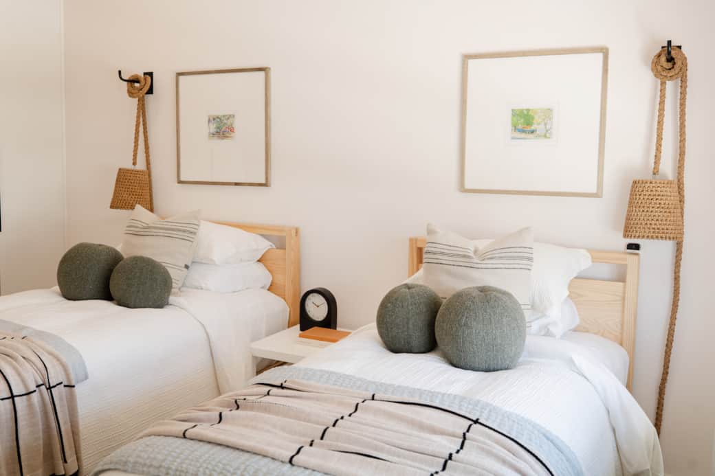 Cozy bedroom with two twins or one king setup, tailored to your stay.