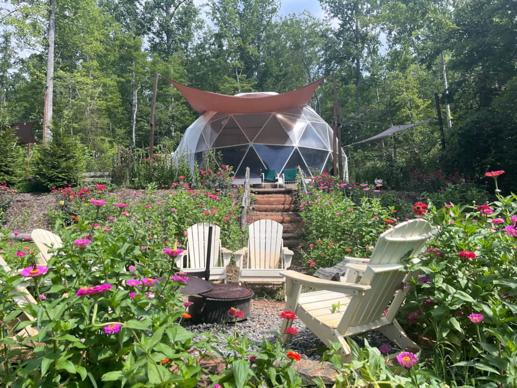 The vibrant colors around the firepit are amazing at the Pondview Dome