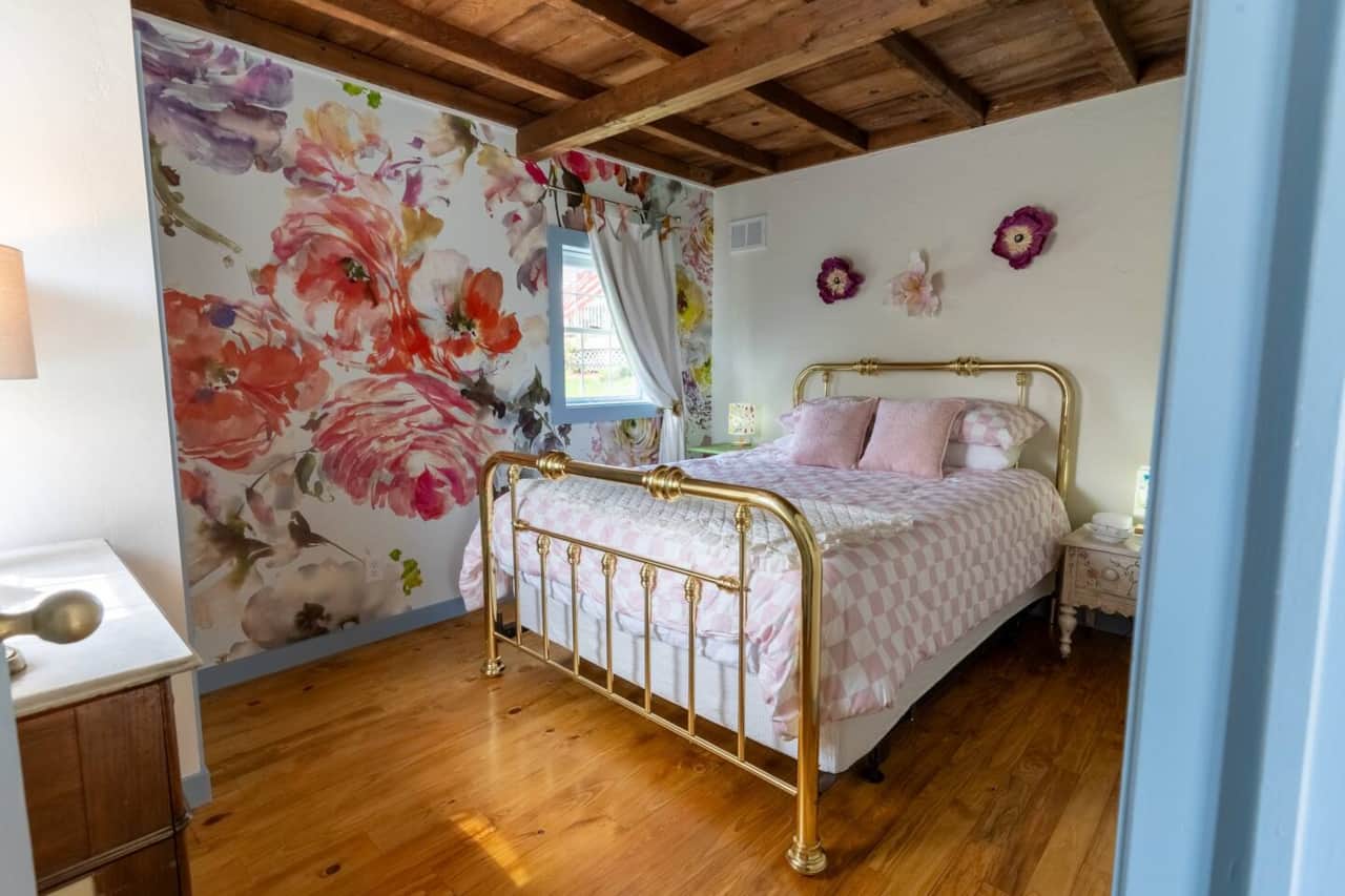 Sleep among the life-sized flowers in Alice's bedroom.