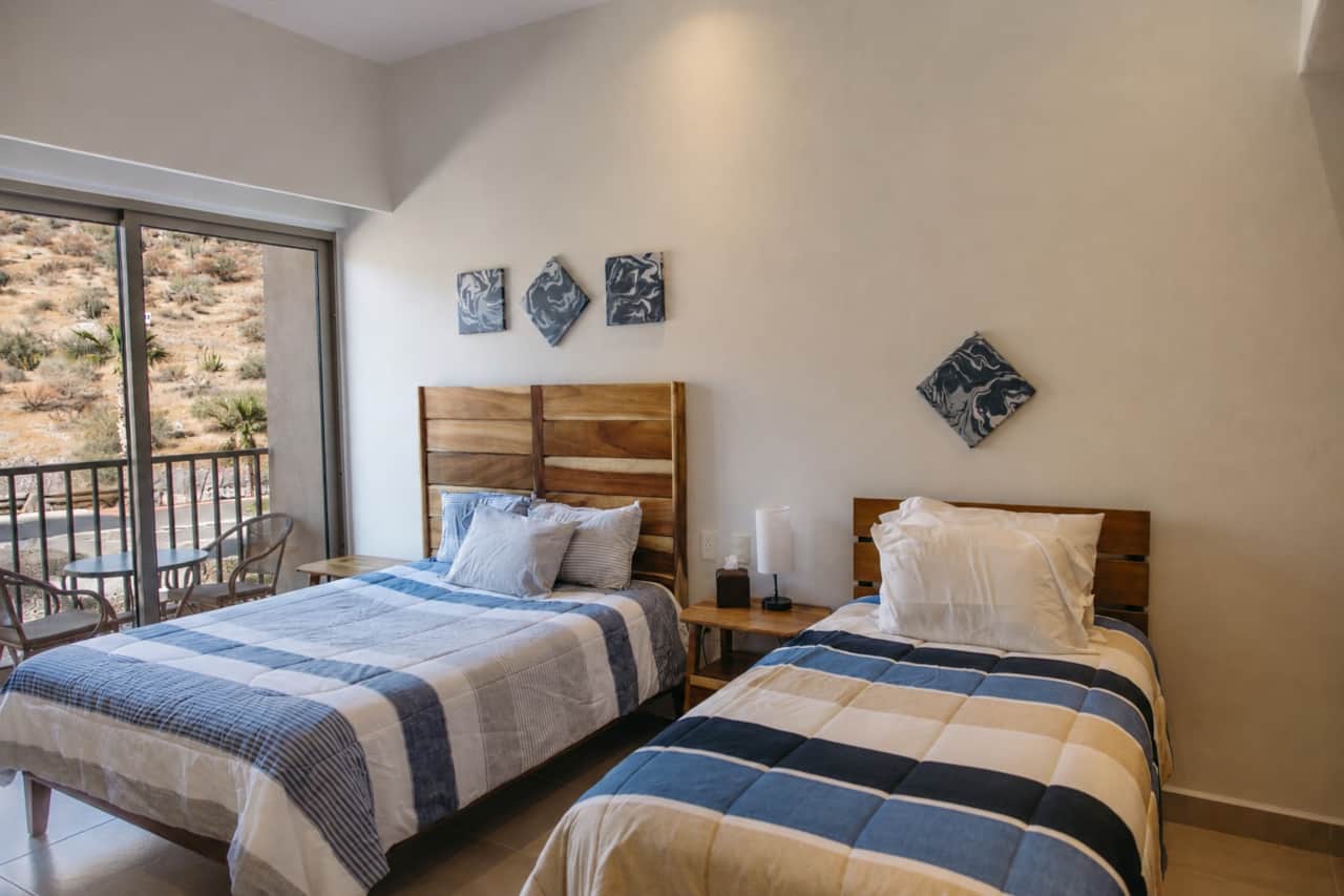 Bedroom 2 Queen and Twin Beds.jpg