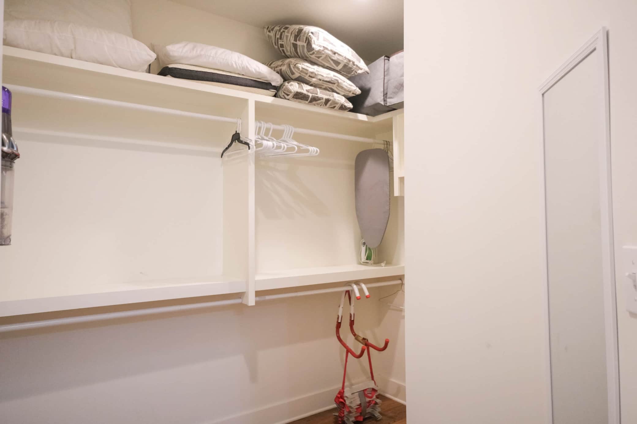 Plenty of storage in master closet.jpg
