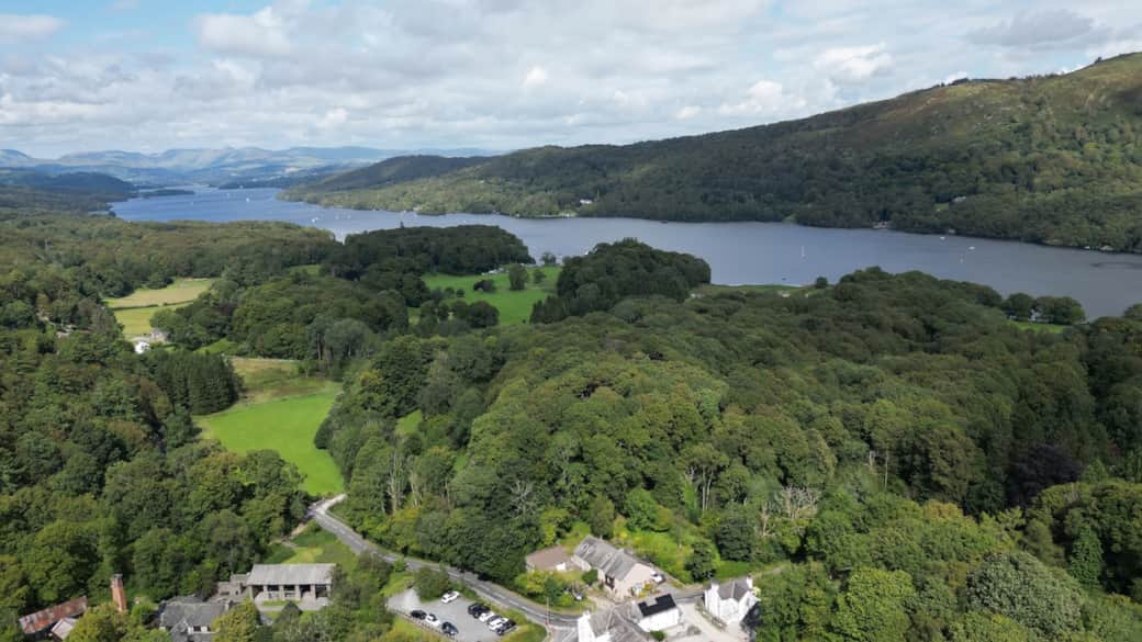 Lake windermere in the background. The barns sits behind Hunters Fold and the gardens wrap around both properties. The lake can be accessed at Lakeside a short walk south connecting to the West Winderemere Way 