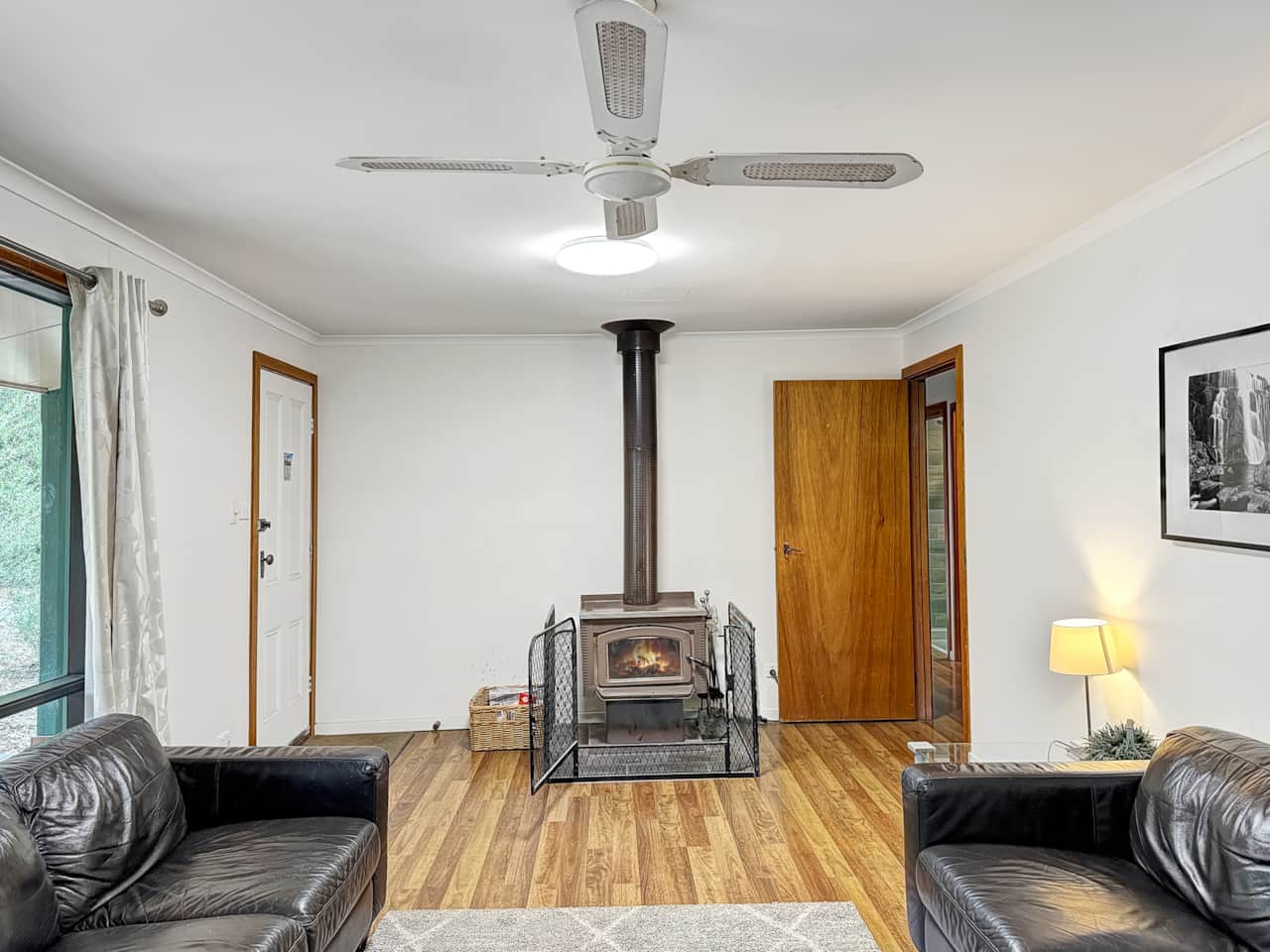 Living room with log fire to keep you cozy