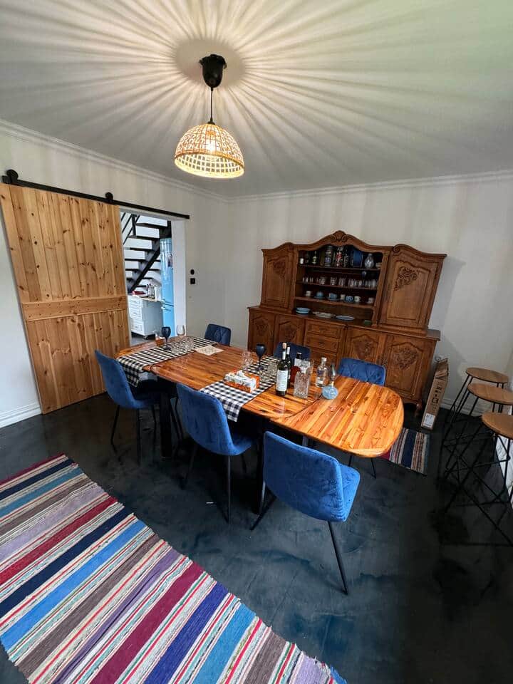 The dinning table is handmade by the owner, and room can expand to sit more people The dinning table is handmade by the owner, and room can expand to sit more people