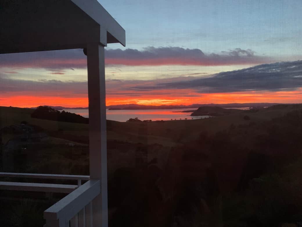 Sunset over the Kerikeri Inlet from the balcony at Wharau Lodge, Kerikeri. 