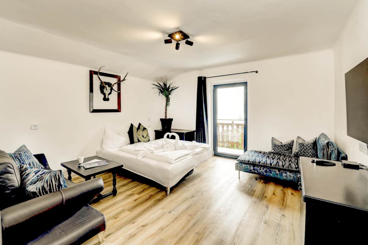Living room with 1 sofa and 1 sleep sofa -  Holiday apartment Das Bergnest.jpg