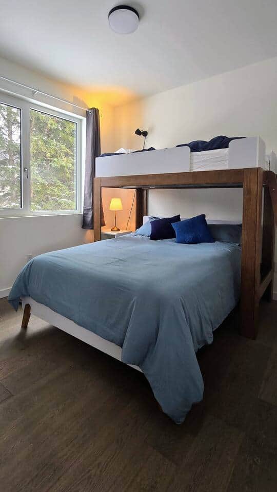 Queen bed with a twin bunk.  I don't know why they call it a 'twin bed' because you can only fit 1.