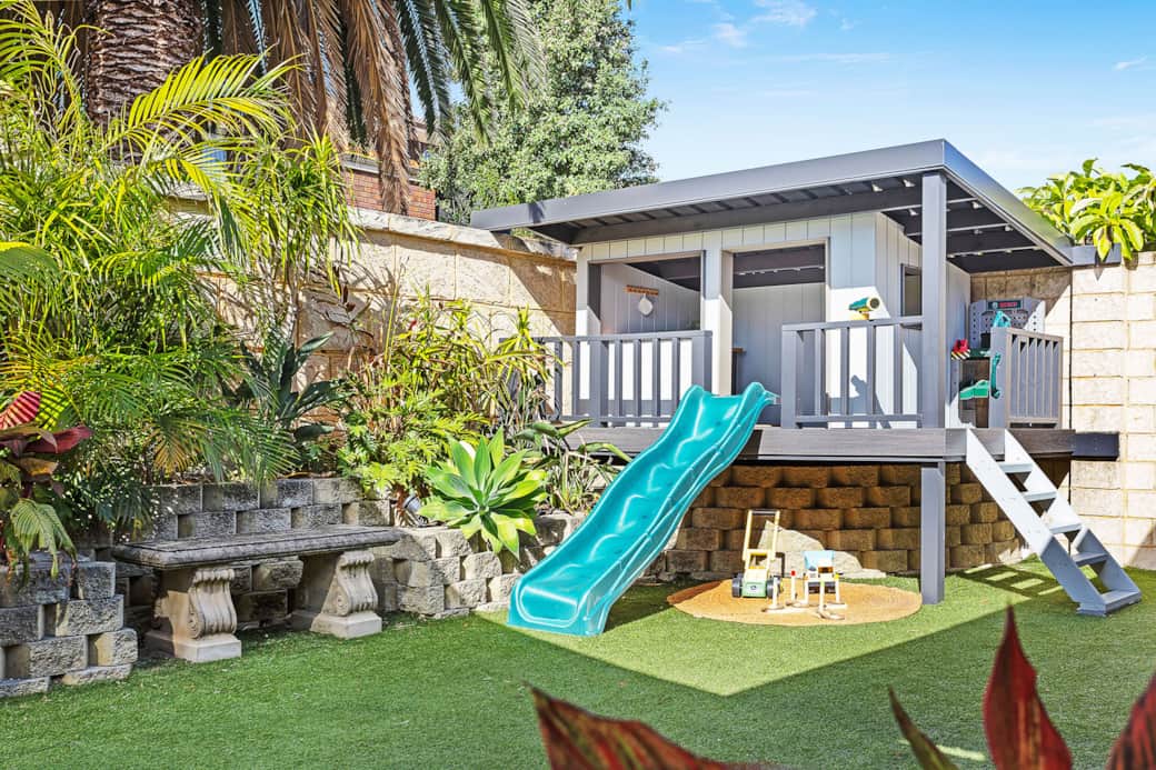 The kids will love the playhouse with play kitchen, slide and plenty of toys The kids will love the playhouse with play kitchen, slide and plenty of toys