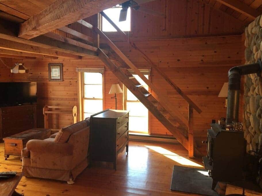 This is the family room. You can see the steps to the loft where the beds are located. This is the family room. You can see the steps to the loft where the beds are located.