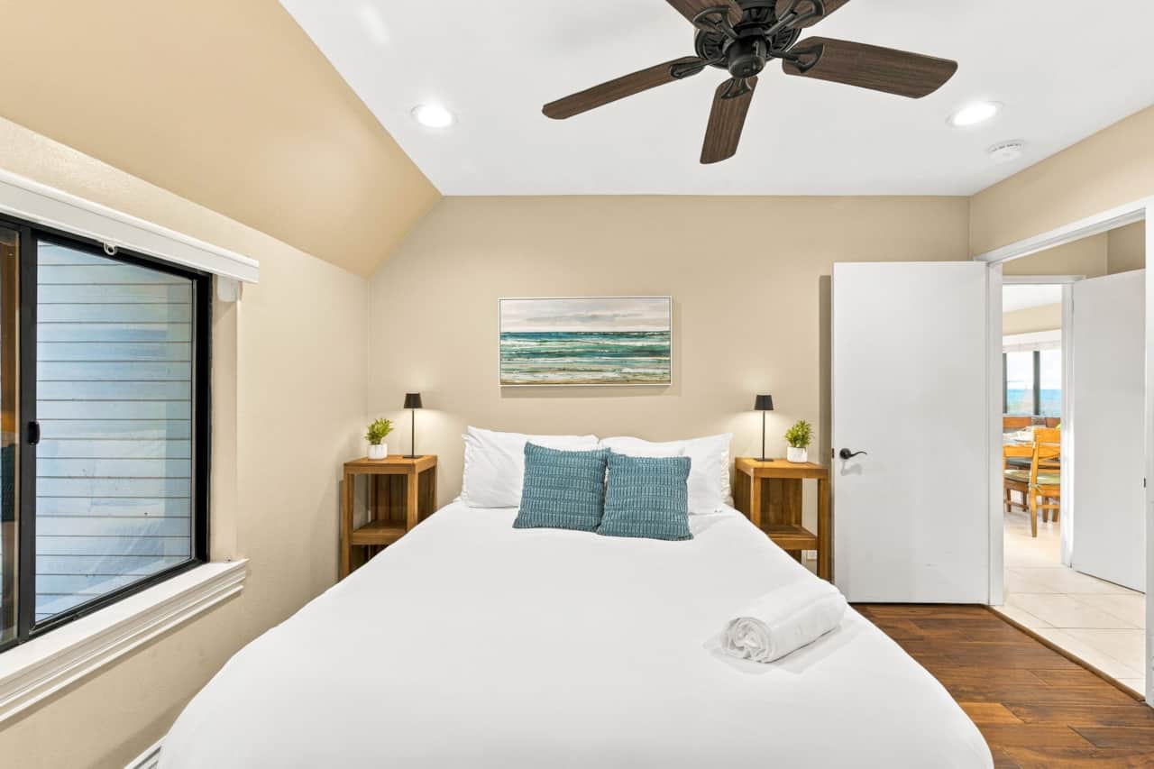 Cozy Bedroom Queen Bed with Vaulted Ceiling Fan 