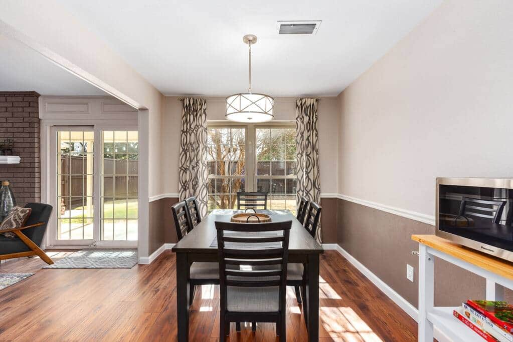 Sunny & bright dining room with table seating for 6. Sunny & bright dining room with table seating for 6.