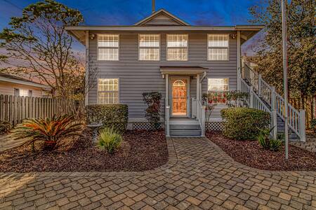 Twilight view of this 6 BR beach home 6 blocks to the beach!