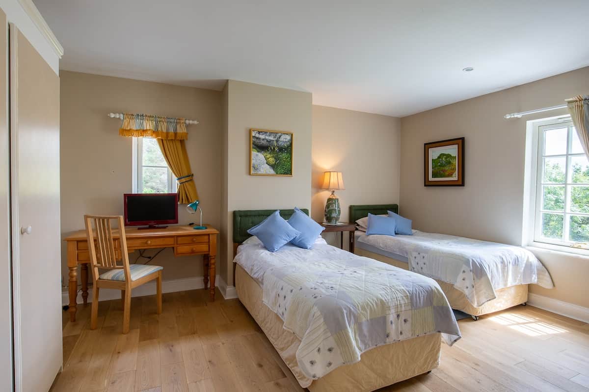 Two of the bedrooms have twin beds, while the three others have king-size double beds.