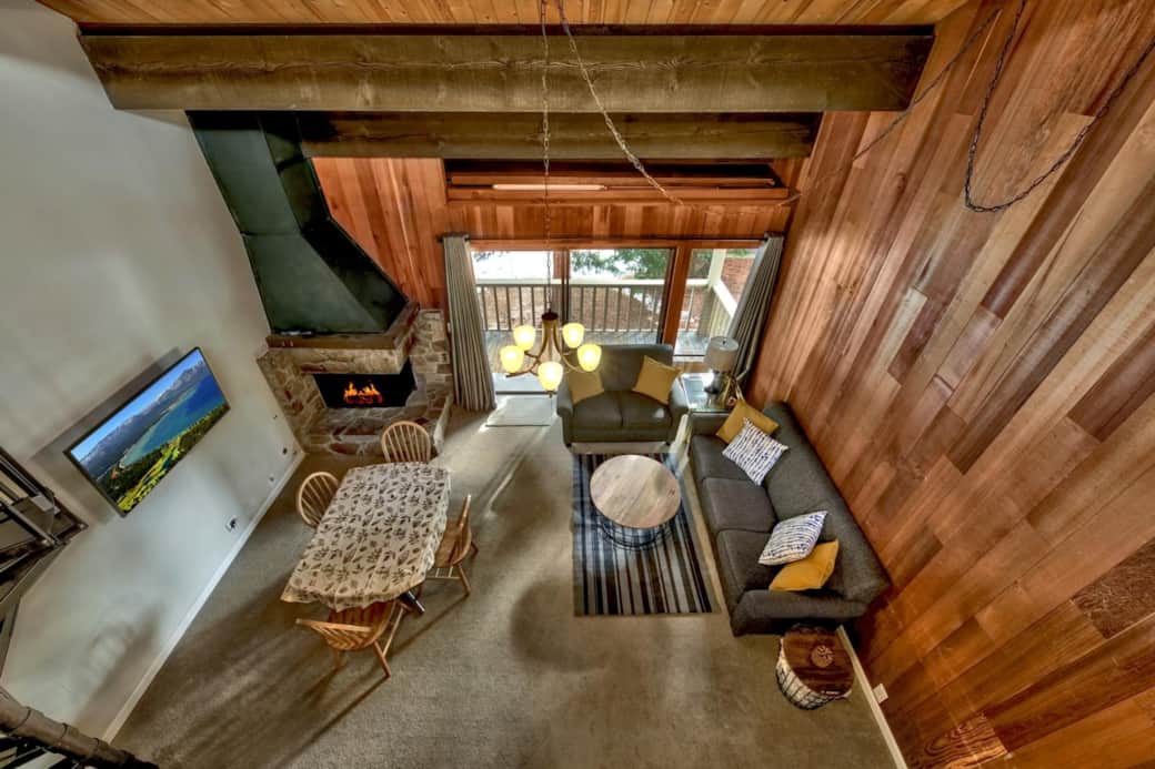 View of living room from 3rd floor loft