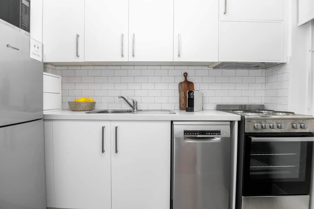 Our compact kitchen complete with a brand-new Bosch dishwasher to enhance your convenience. This space seamlessly connects to the lounge and dining area. Our compact kitchen complete with a brand-new Bosch dishwasher to enhance your convenience. This space seamlessly connects to the lounge and dining area.
