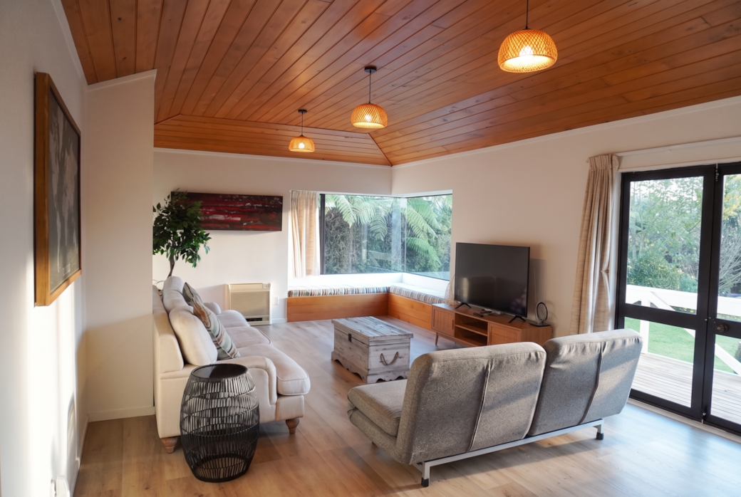 Looking into the lounge room from the entrance way. Enjoy the views out to the back yard through the