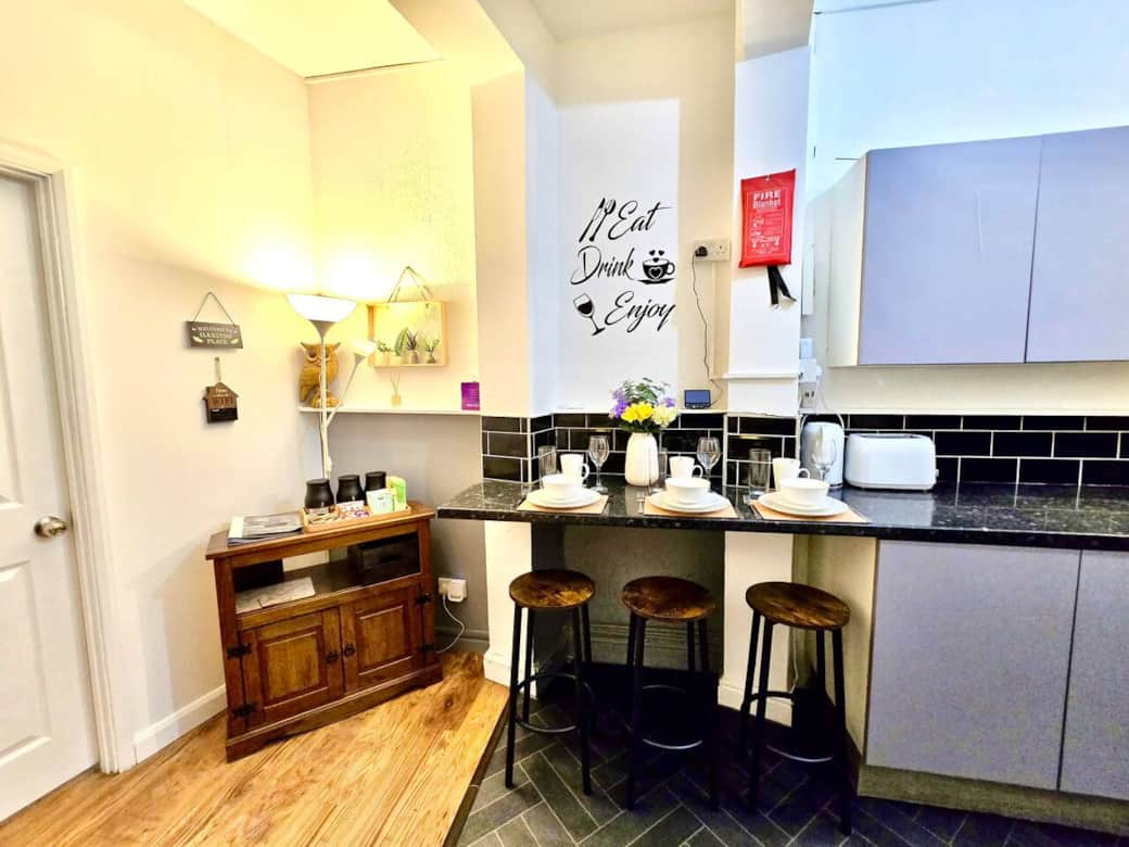 Bar table for sharing meals, fit 4 people, spacious and homey, emergency fire blanket, carbon monoxide device, first aid kit, antibacterial hand gel, tissues are located in the kitchen for guest safety and comfort Bar table for sharing meals, fit 4 people, spacious and homey, emergency fire blanket, carbon monoxide device, first aid kit, antibacterial hand gel, tissues are located in the kitchen for guest safety and comfort