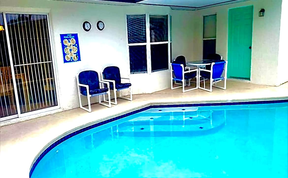 Plenty of pool side furniture; a space to enjoy the Florida sunshine