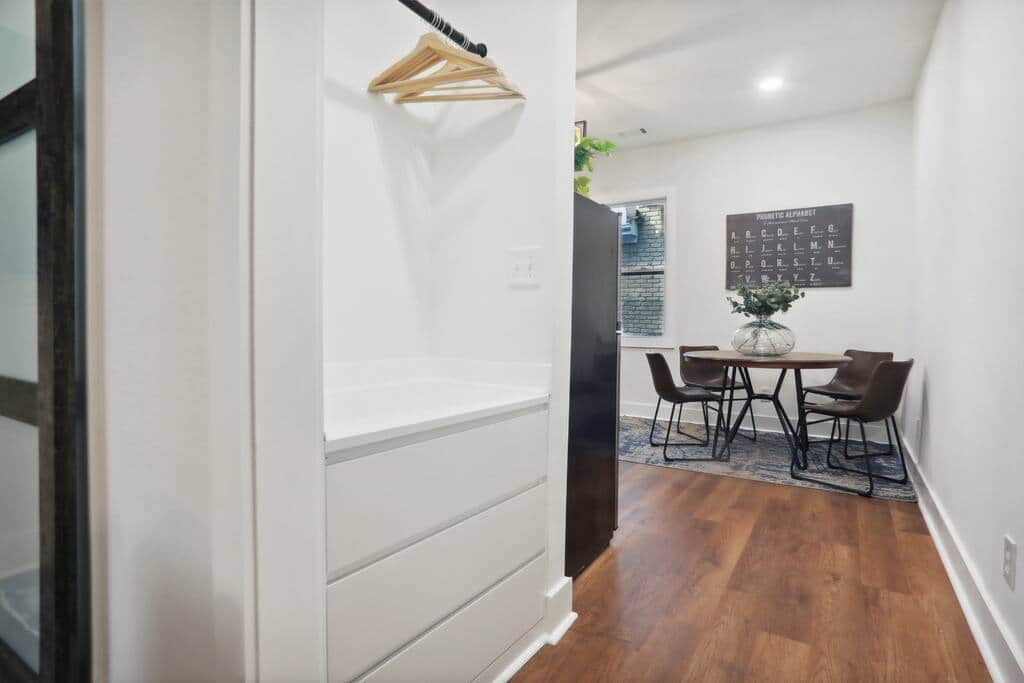 Walk into the dining room and kitchen - we provide 2 robes and iron located in the hall closet
