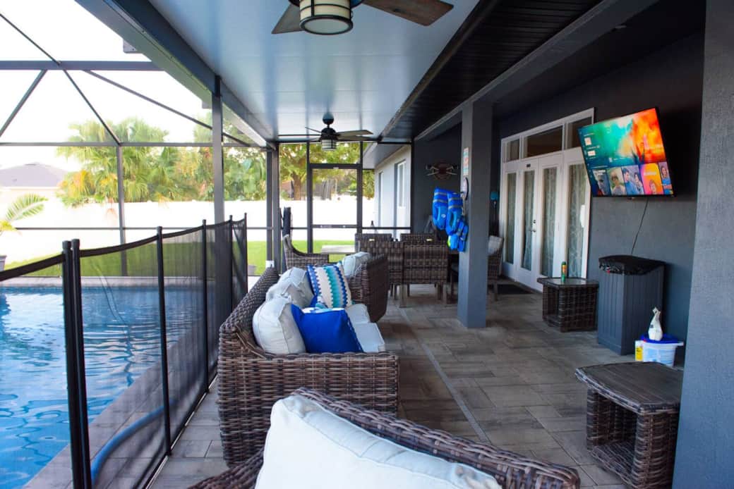 Watch your favorite shows & movies on the patio TV -- from the comfort of the cushioned chairs or pool