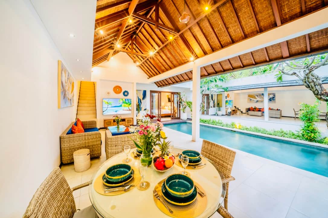 Pool and dining area for open-air tropical living in Villa Julissa in Seminyak, Bali