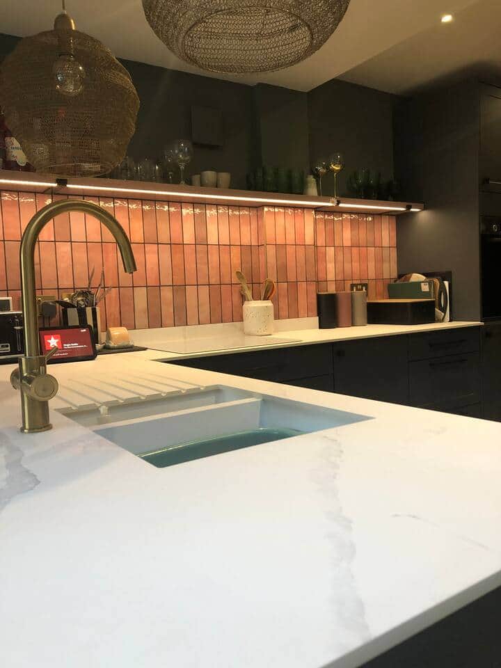 View of instant hot water tap and kitchen worktop