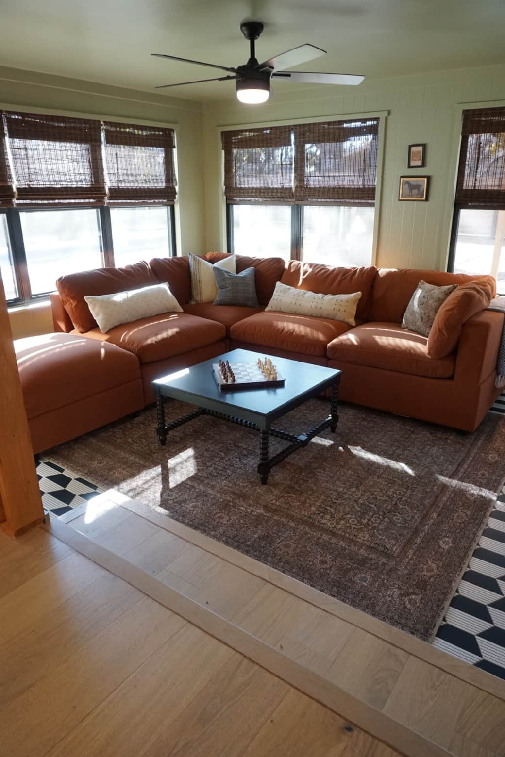 cuddle up on the coziest sectional and enjoy the sun-filled sunken room right off the kitchen and dining