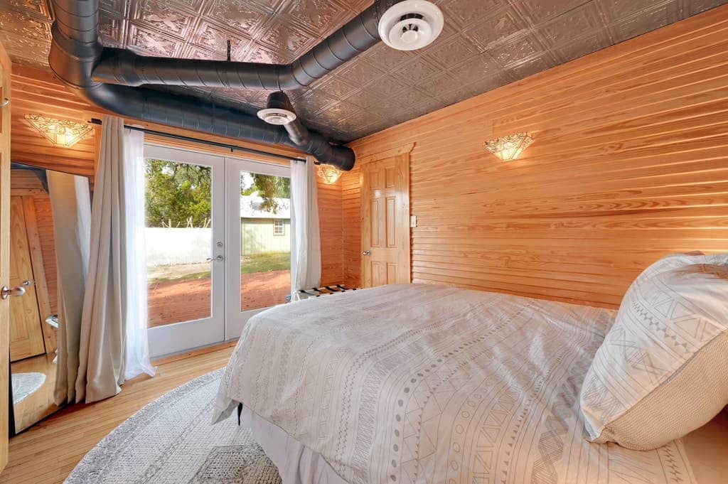 Master ensuite with french doors to the back deck and hot tub