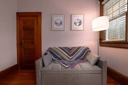 Queen bedroom with full-size pullout couch.