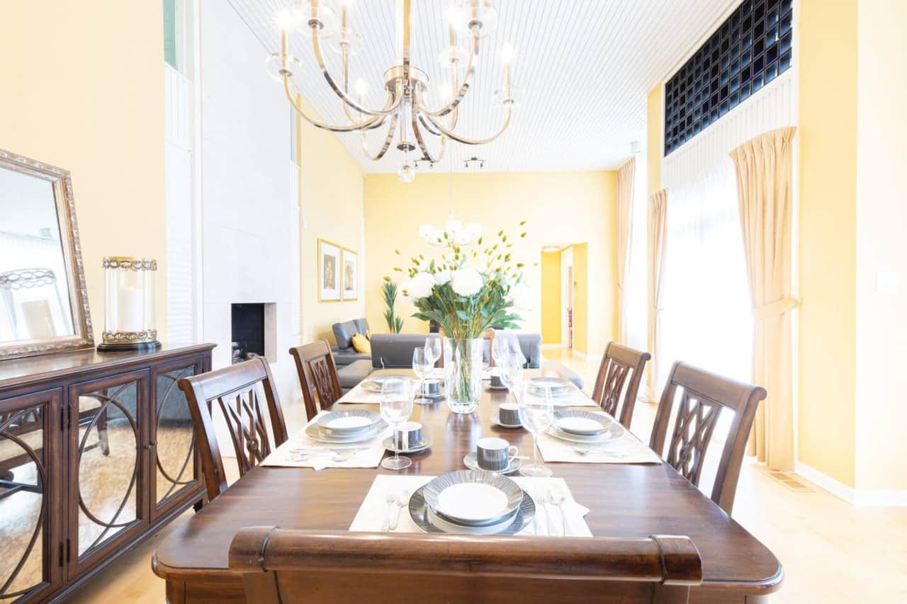 Dining area with 14 feet high ceilings