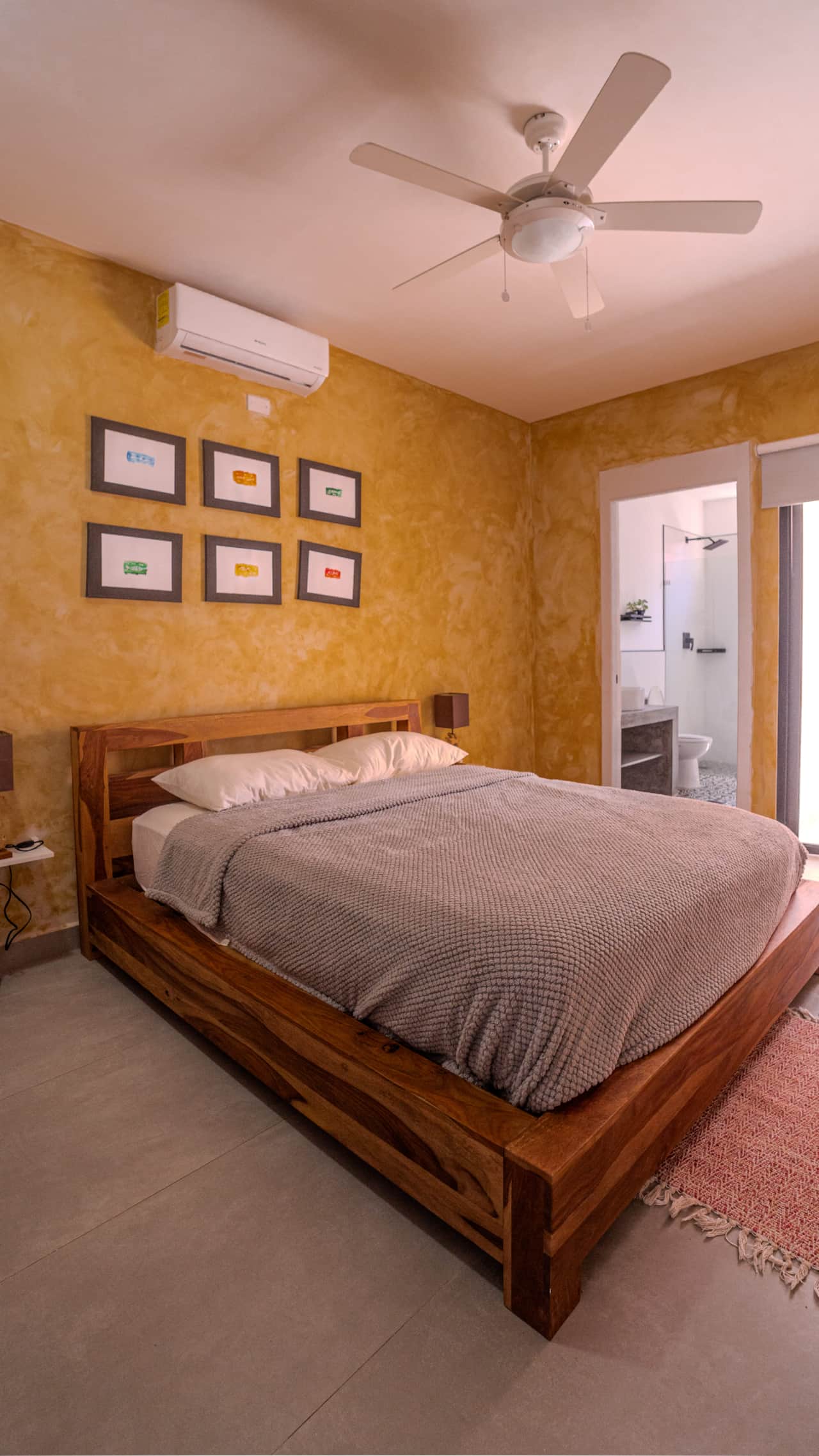 Golden walls create a warm, inviting oasis inside this off-grid cabin in Panama.